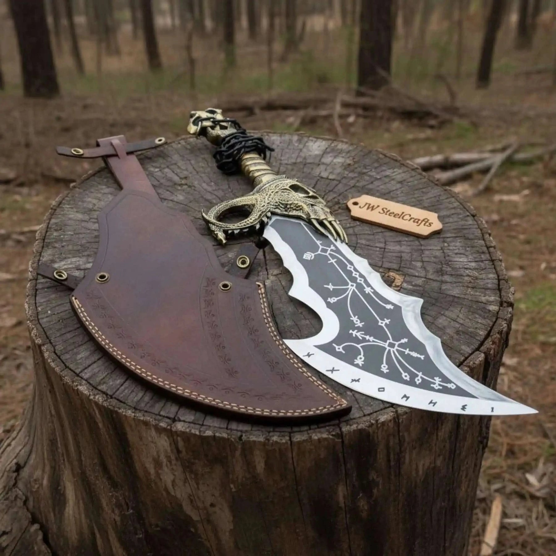 Handmade damascus steel knife with premium handle on dark surface