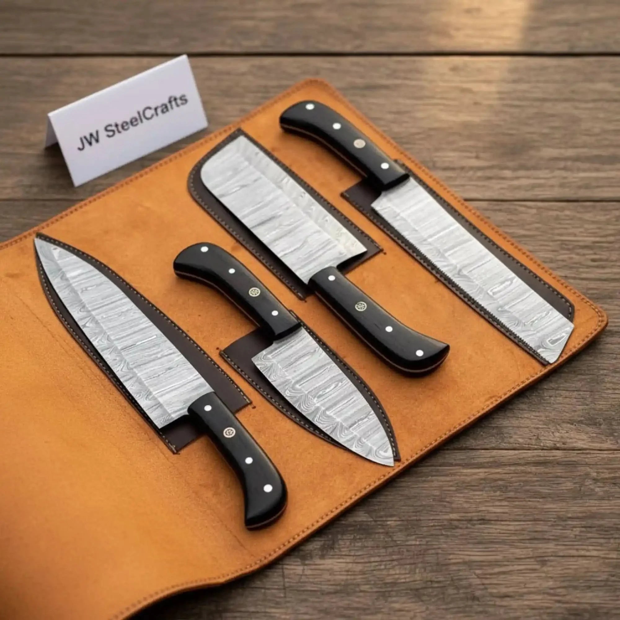 Handmade damascus steel knife with wood handle on dark surface