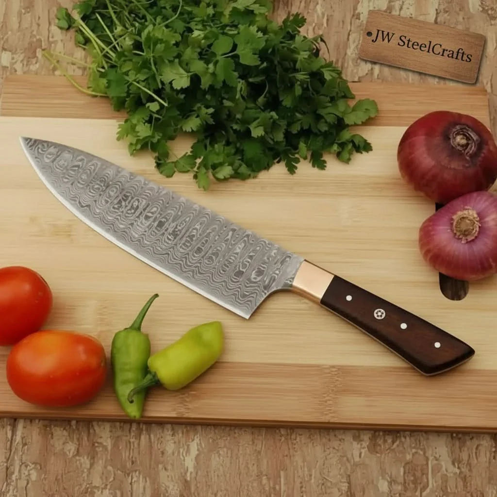 Handmade damascus steel knife with premium handle on dark surface