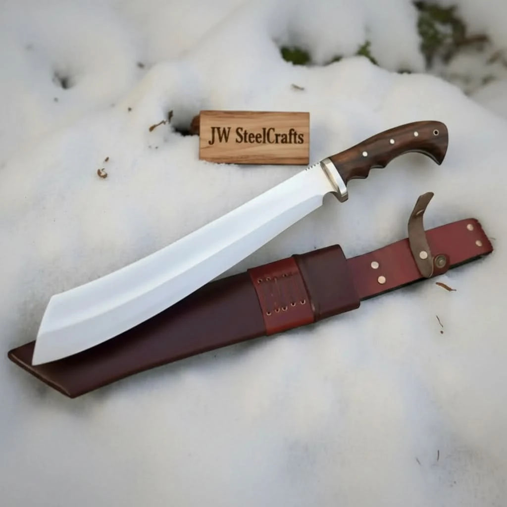 Handmade carbon steel steel knife with premium handle on dark surface