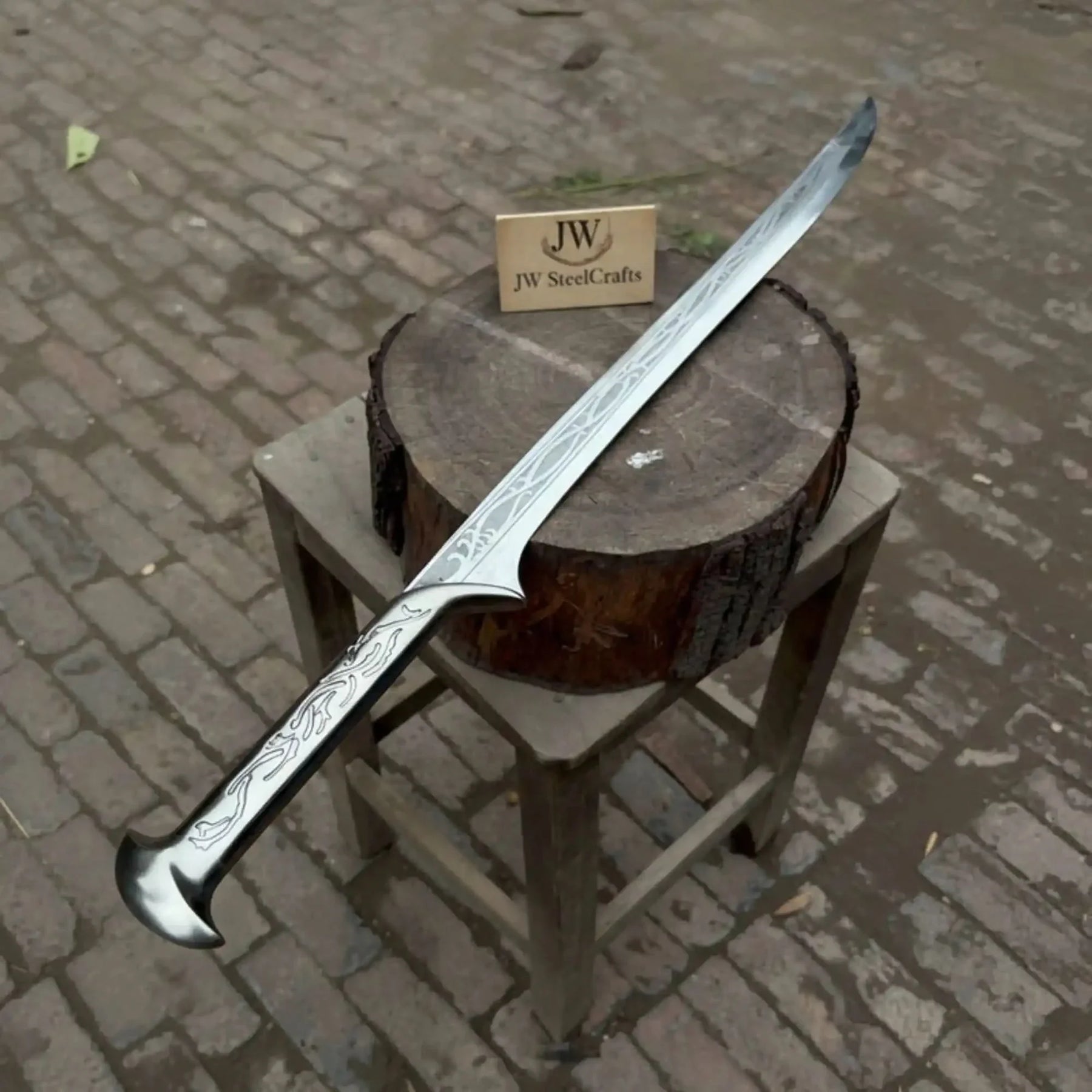 Full-length carbon steel steel replica sword with premium handle on dark background
