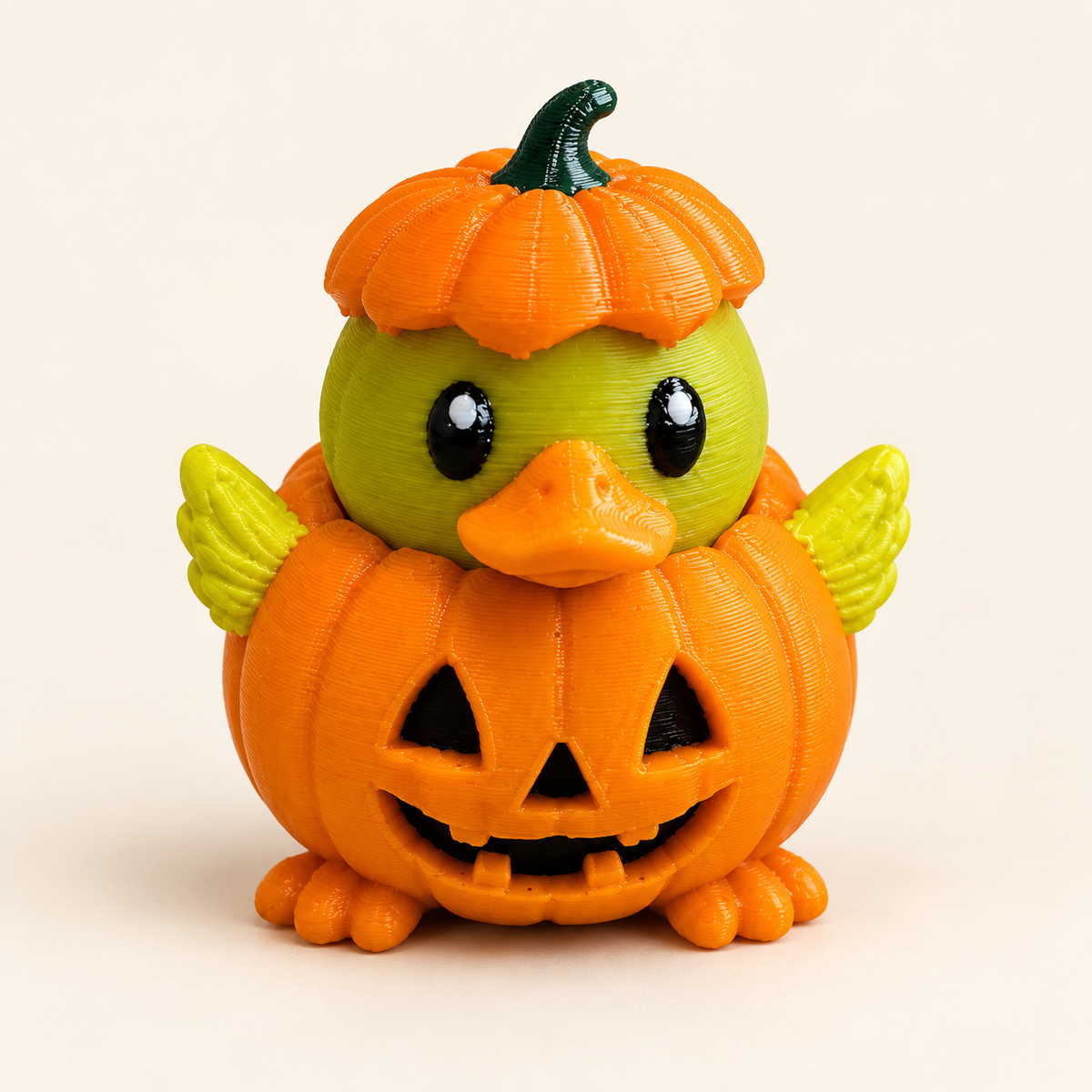 Halloween pumpkin duck figurine with jack-o-lantern body and pumpkin hat
