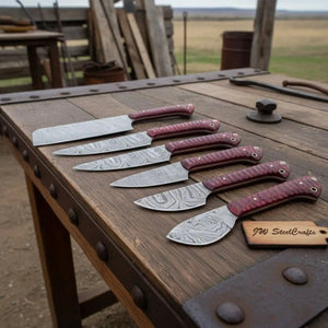 Handmade damascus steel knife with wood handle on dark surface