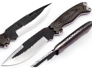 Handmade damascus steel knife with premium handle on dark surface