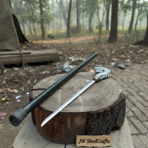 Handmade damascus steel knife with premium handle on dark surface