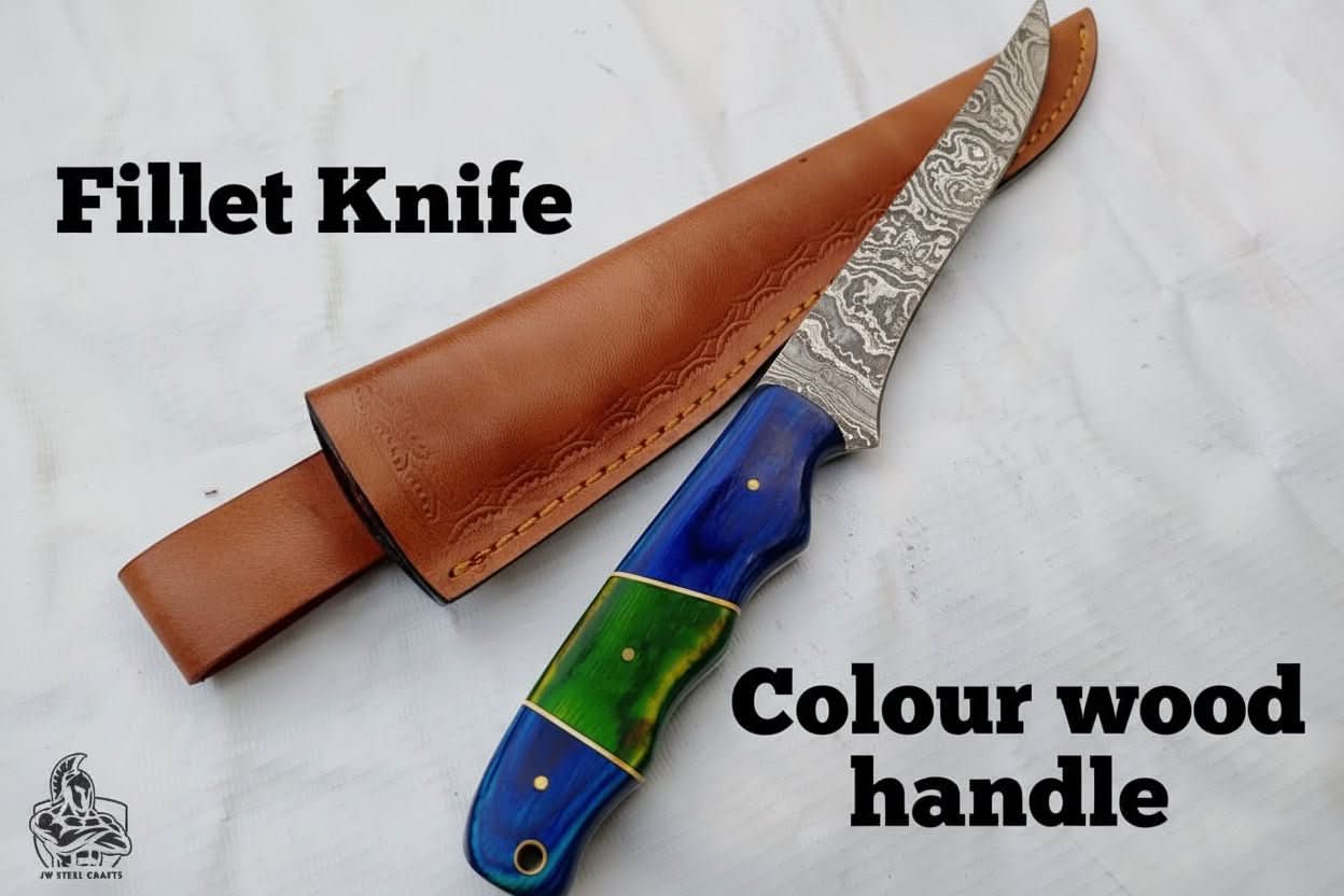 Handmade damascus steel knife with wood handle on dark surface