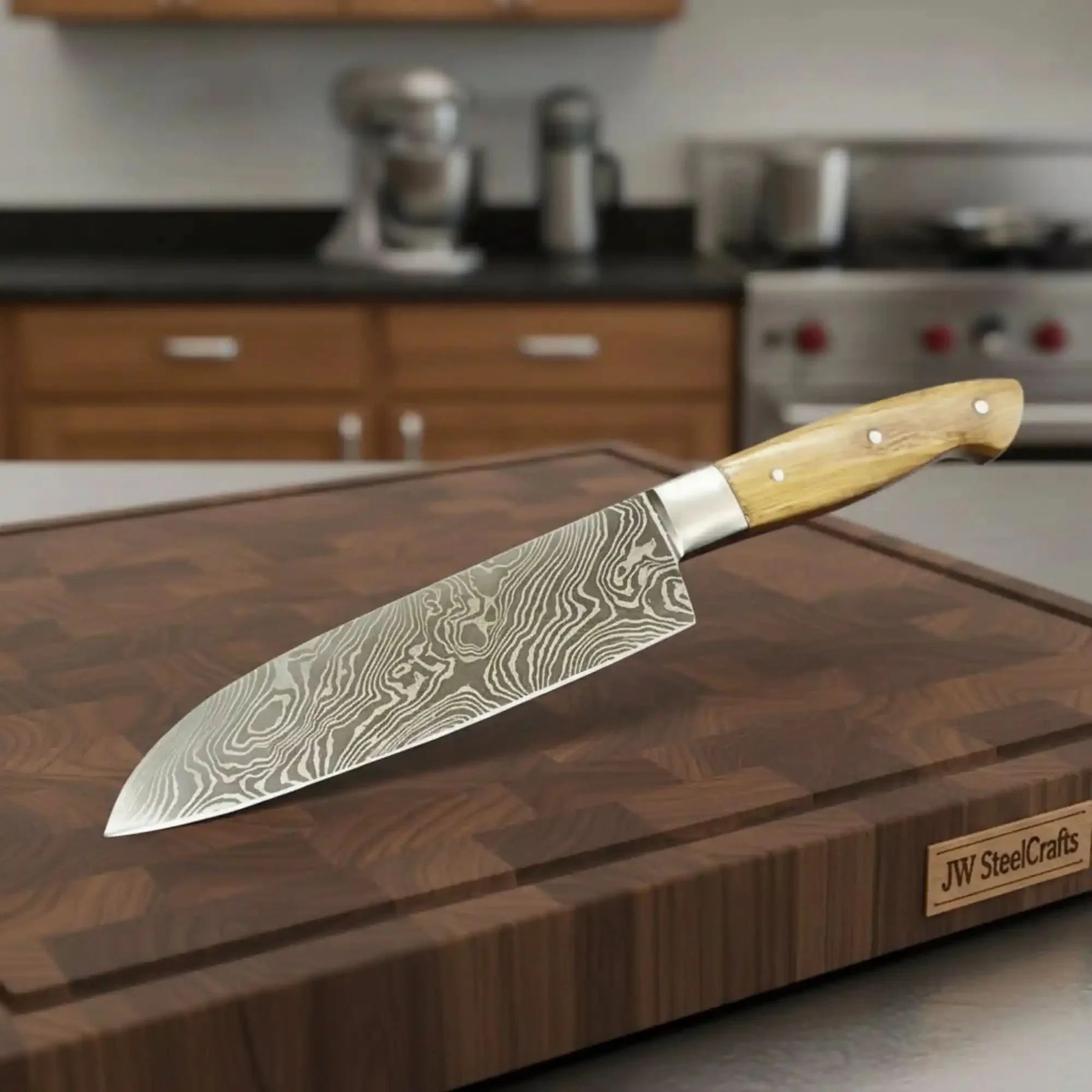 Handmade damascus steel knife with wood handle on dark surface