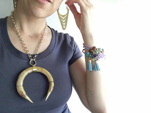 La Fletcha hoop earrings, metalwork arrow hoops, geometric jewelry, sculptural earrings