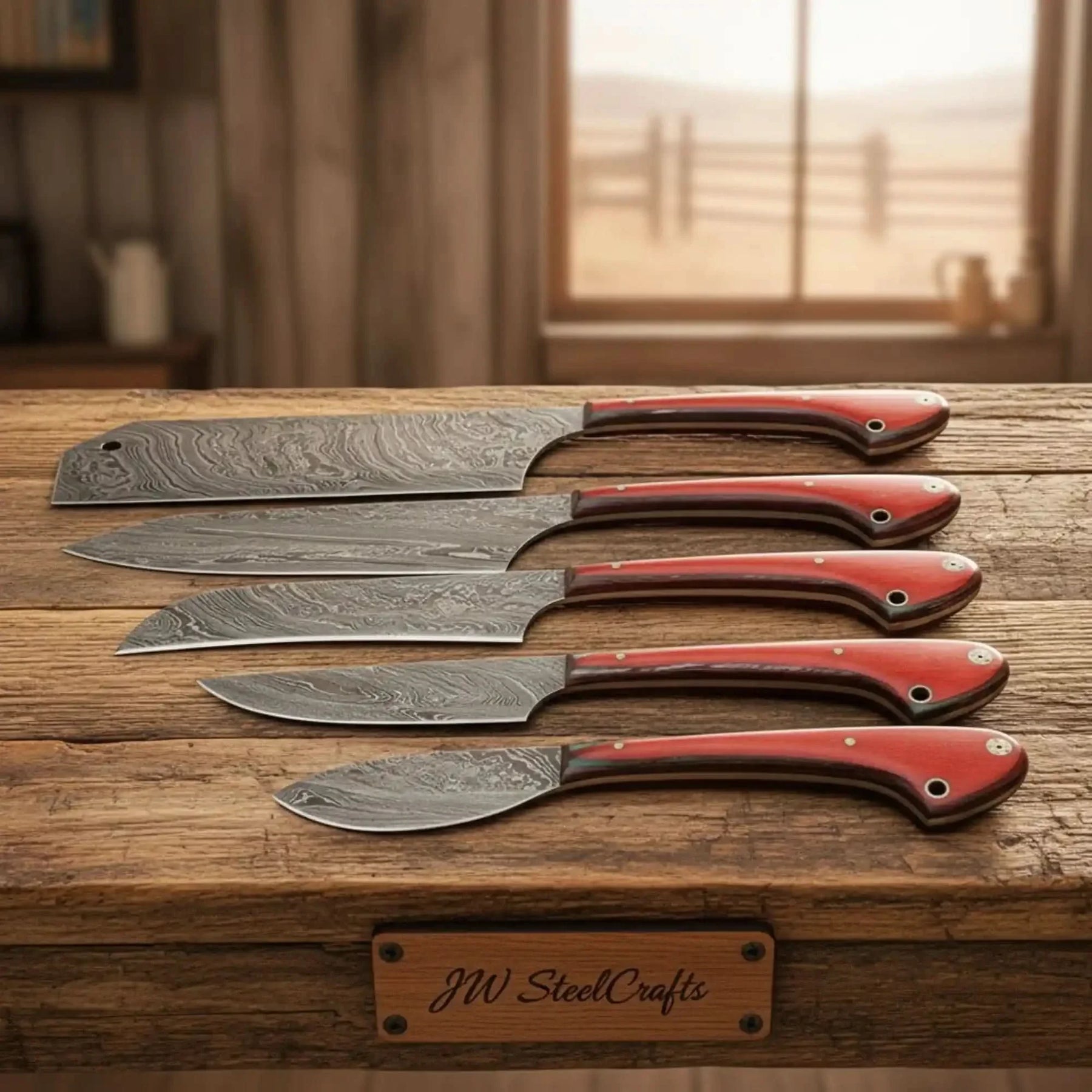 Handmade damascus steel knife with wood handle on dark surface
