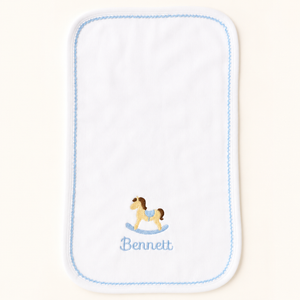 Personalized white baby bib with blue trim