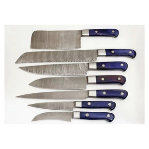 Handmade damascus steel knife with premium handle on dark surface