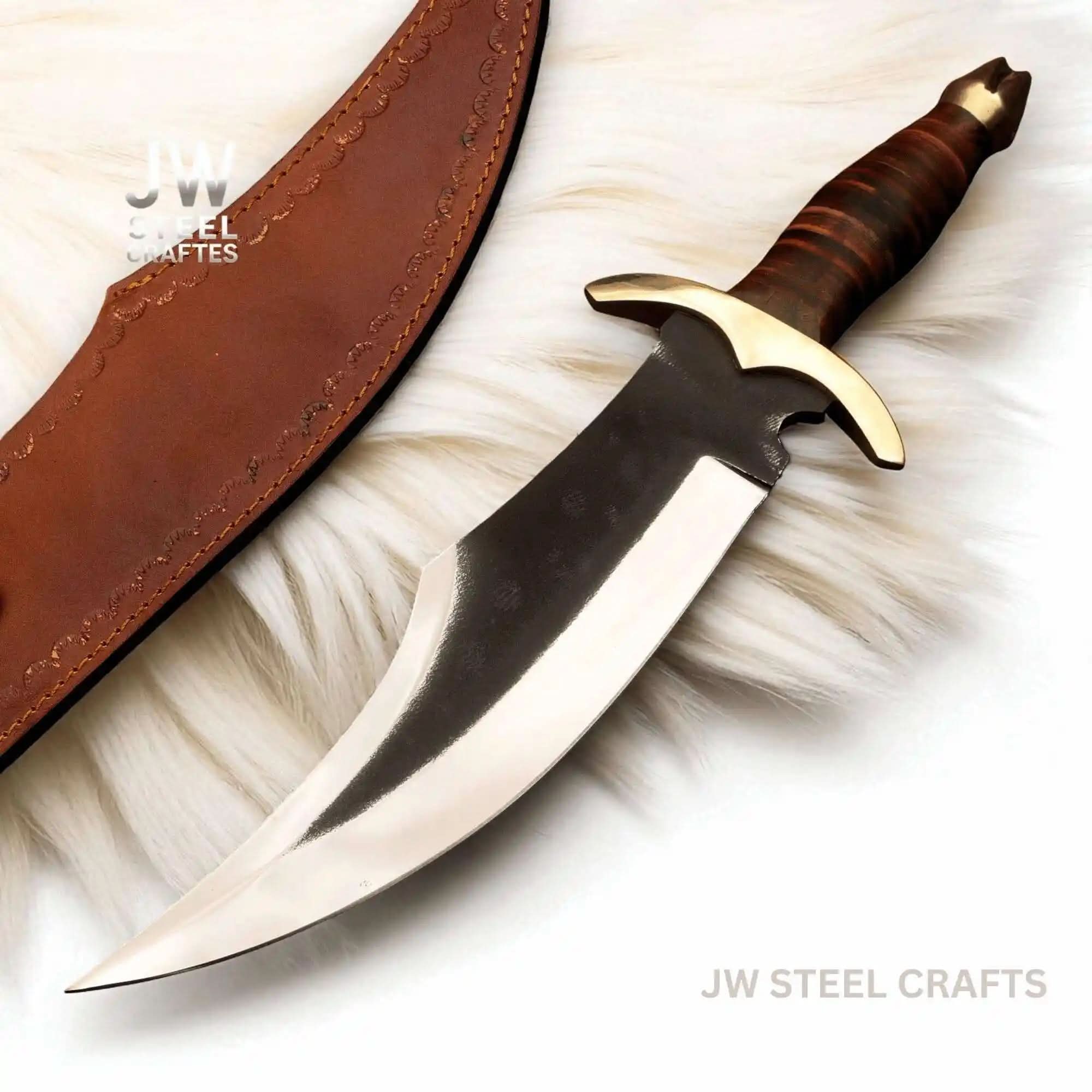 Handmade damascus steel knife with premium handle on dark surface