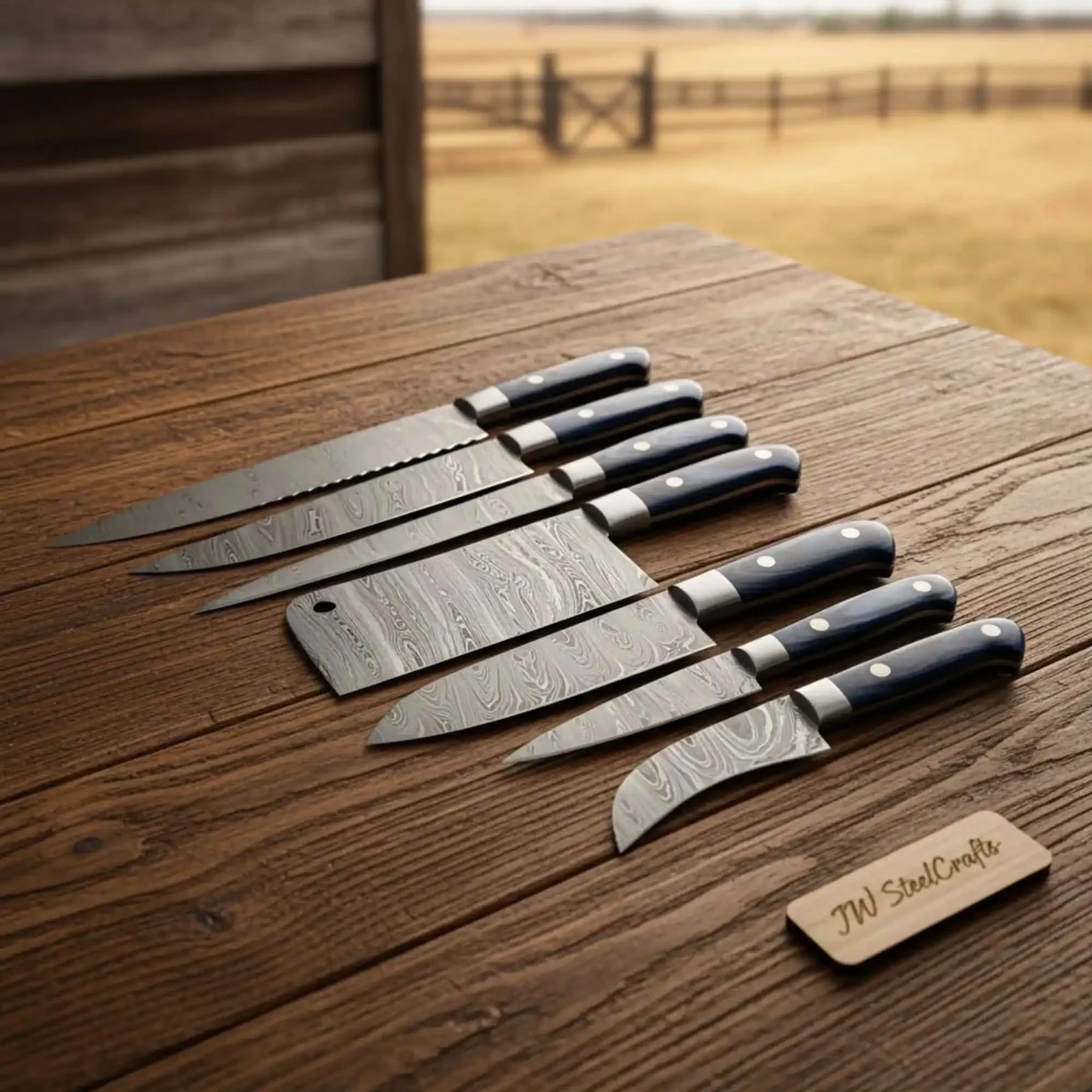 Handmade damascus steel knife with resin handle on dark surface