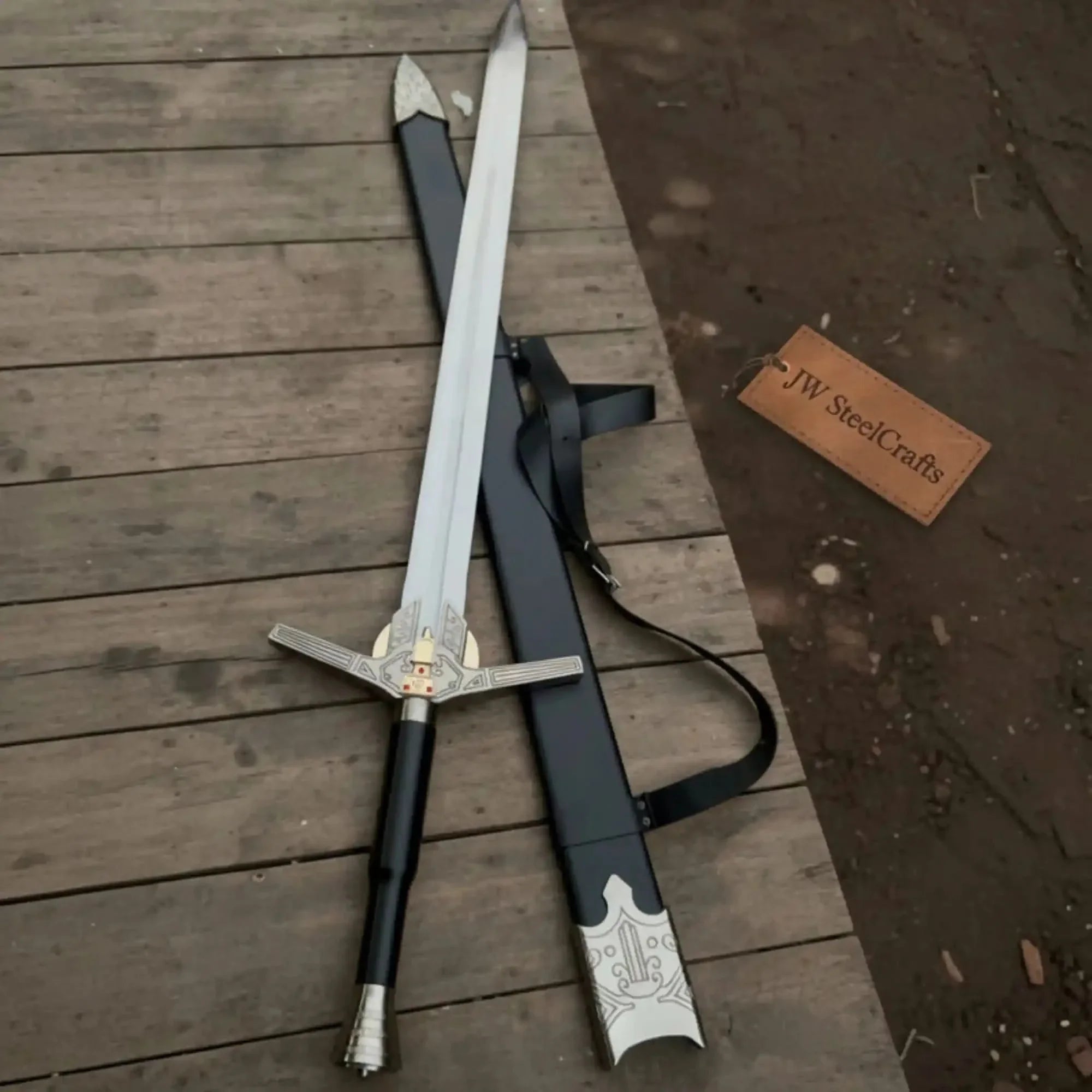 Full-length damascus steel replica sword with premium handle on dark background