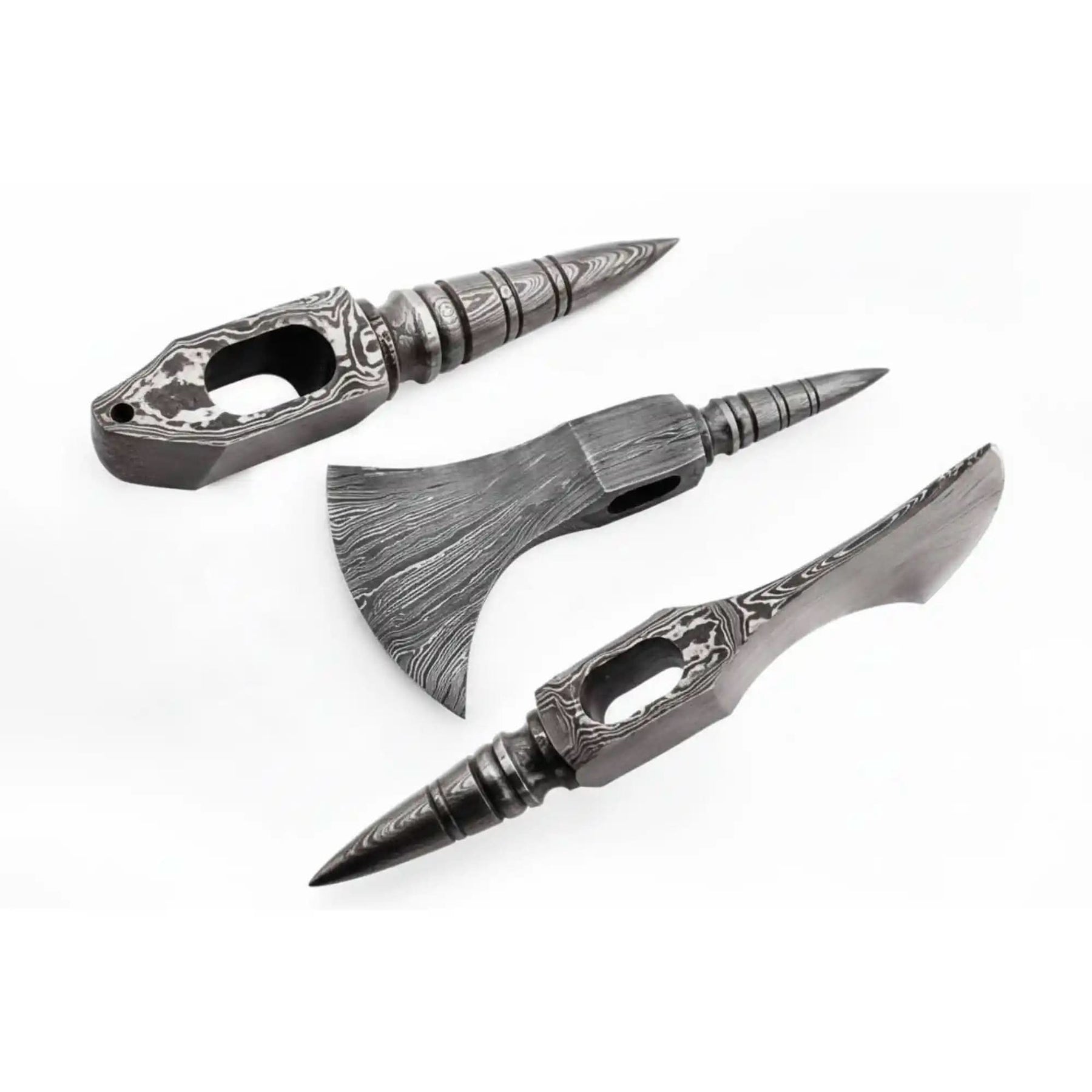 Damascus steel axe head with premium handle on rustic wood surface