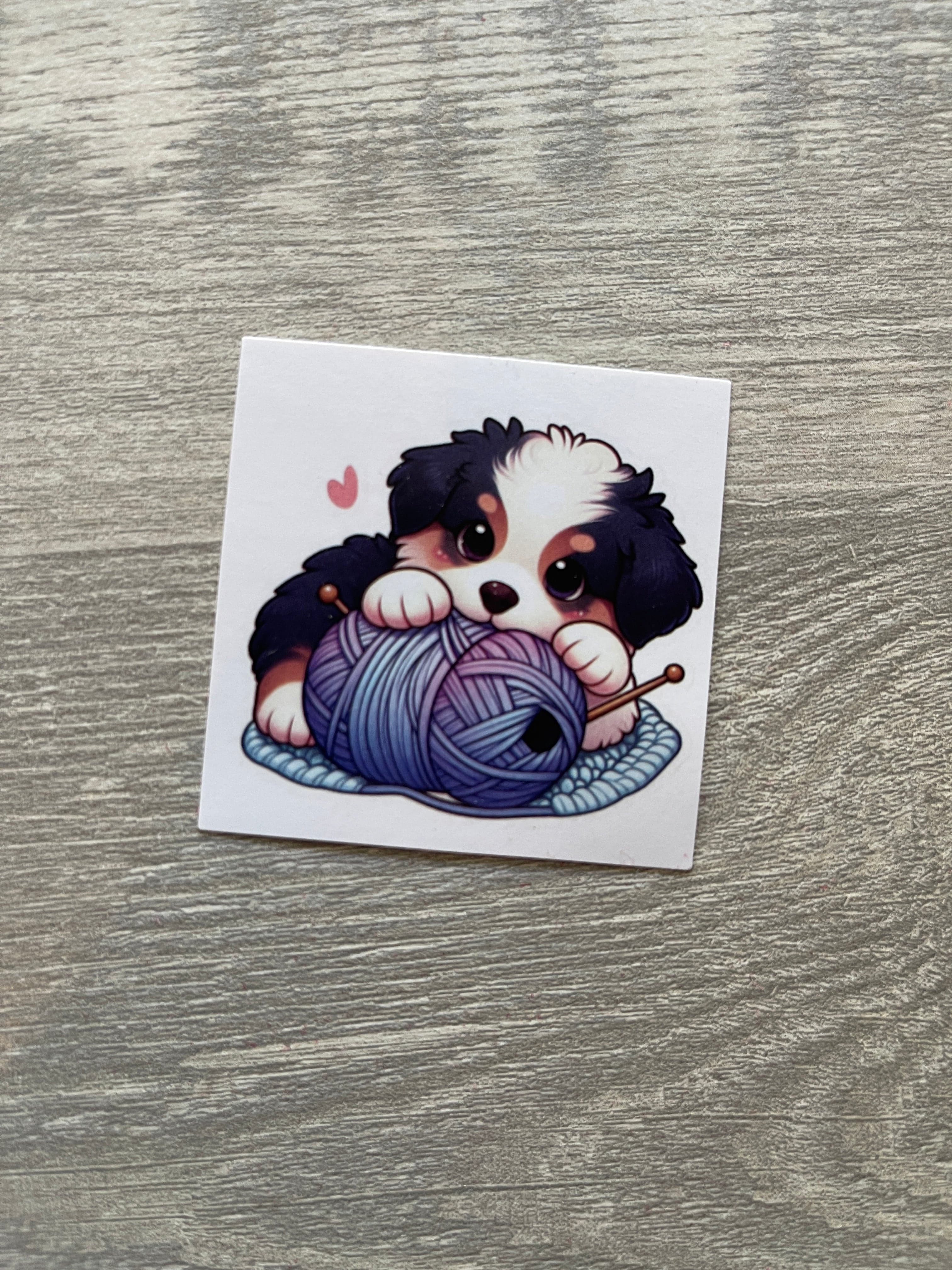 Puppy with Yarn on a Rug Sticker