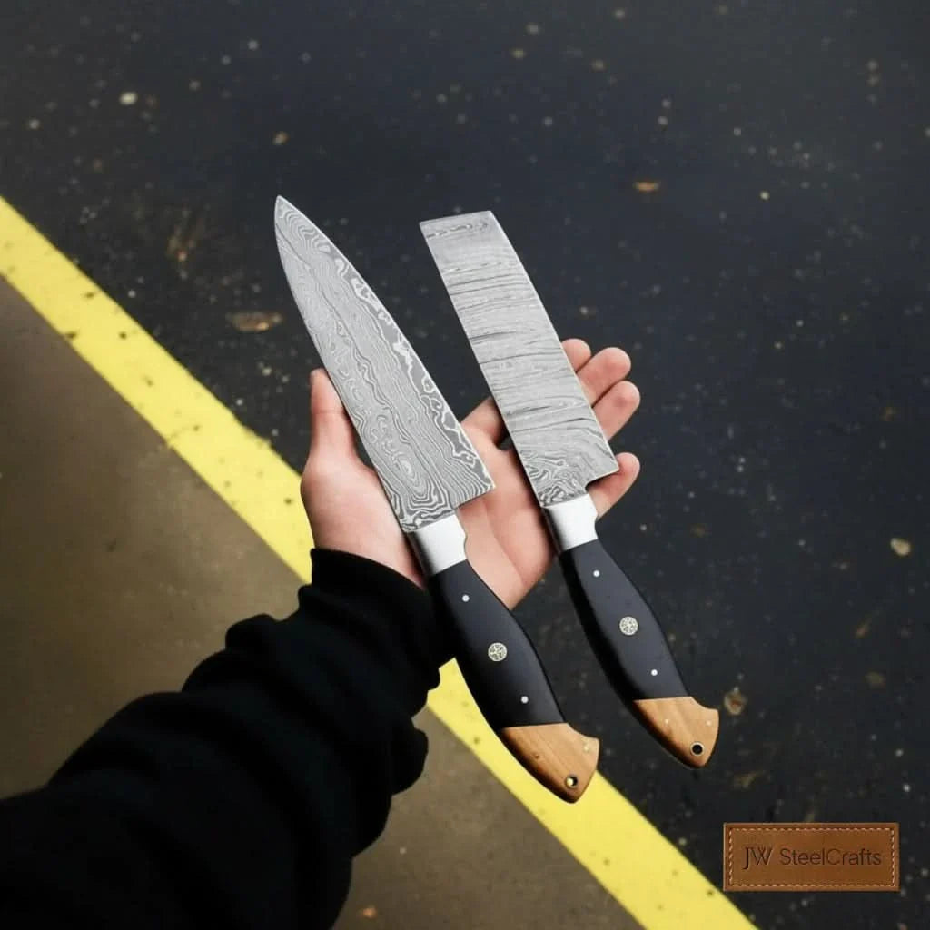 Handmade damascus steel knife with wood handle on dark surface