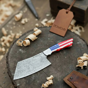 Handmade damascus steel knife with premium handle on dark surface
