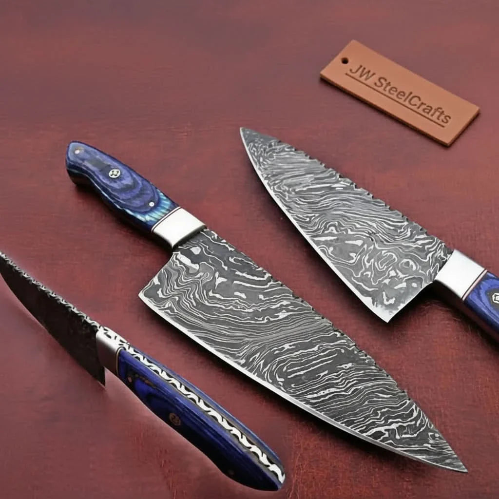 Handmade damascus steel knife with wood handle on dark surface