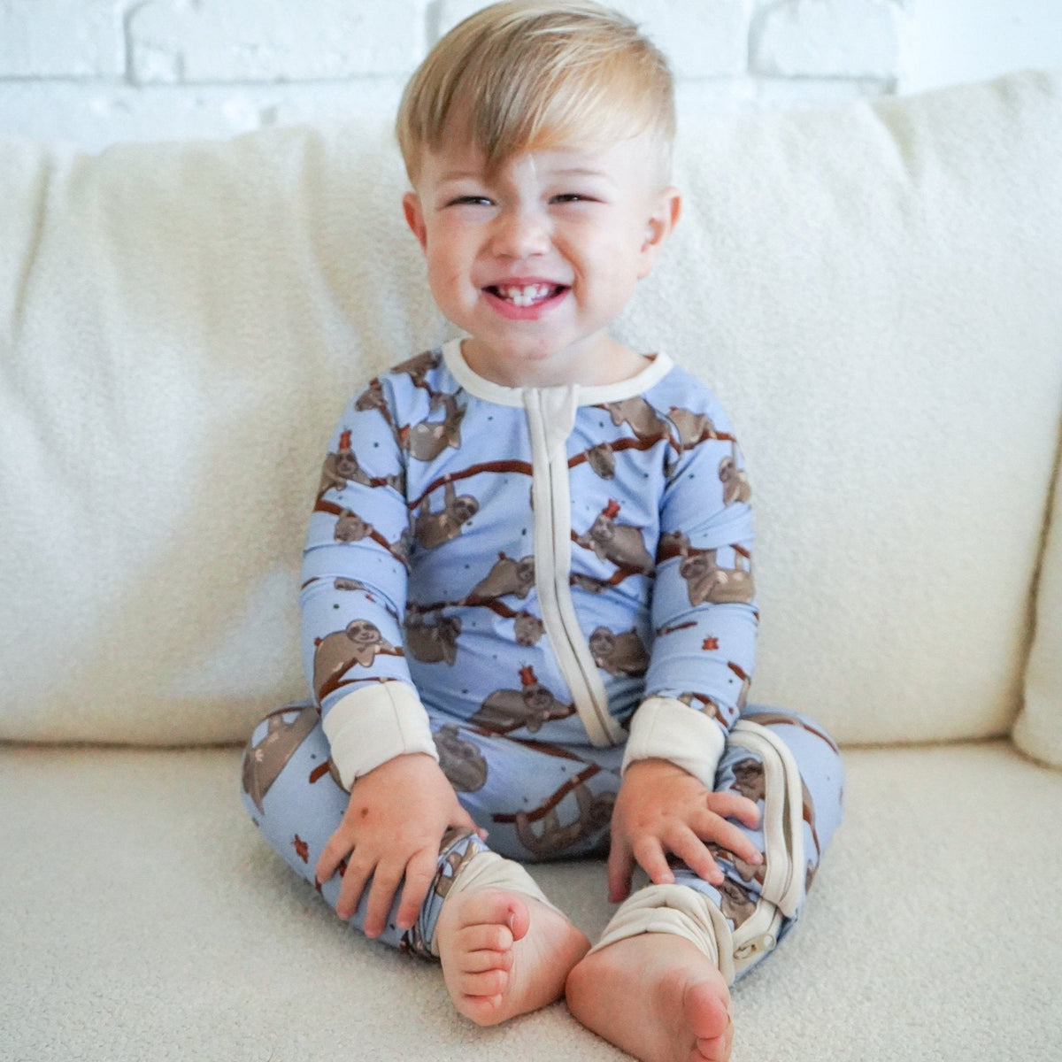 Sloth bamboo baby zip pajamas with hand drawn animal print