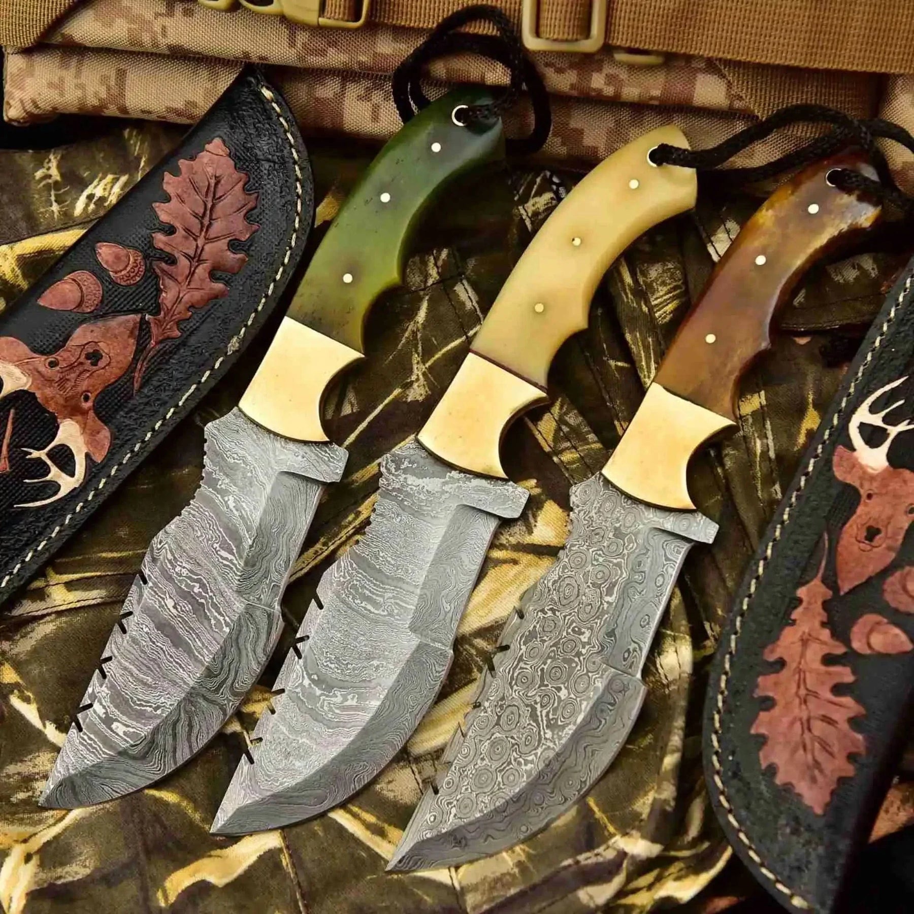 Handmade damascus steel knife with premium handle on dark surface