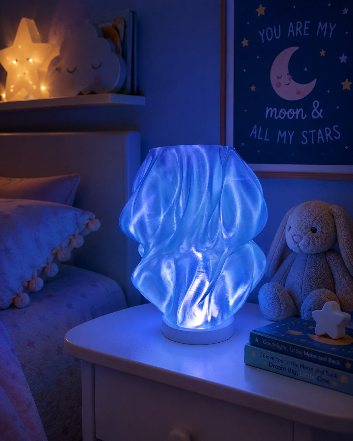 3D printed blue color changing LED lamp by The Tween Space styled on a kids room nightstand