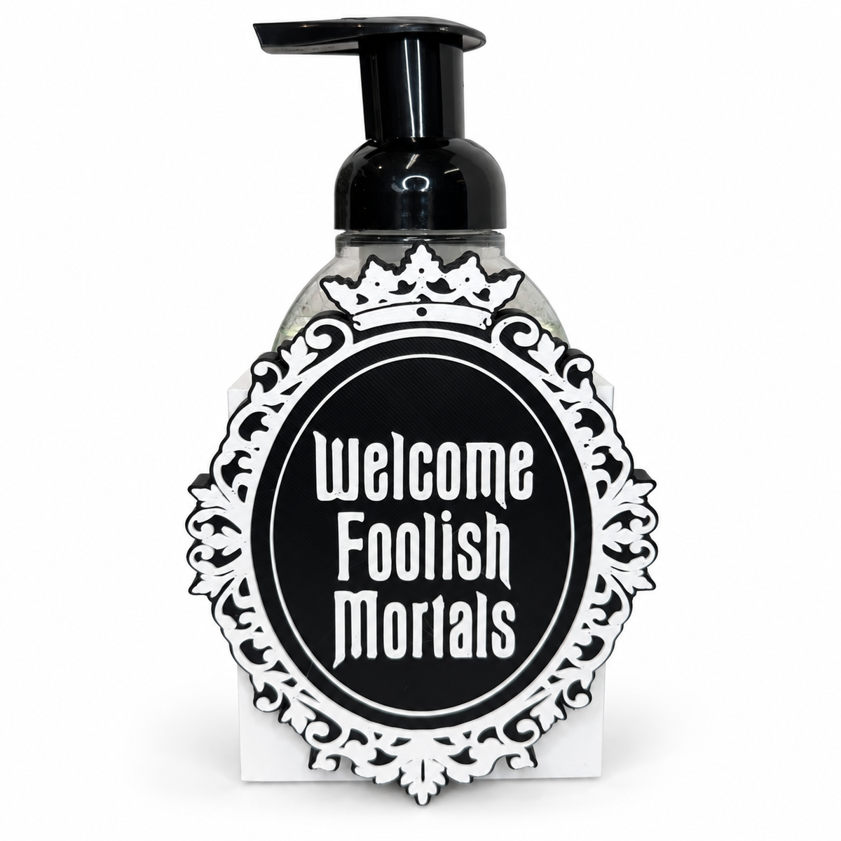 Welcome Foolish Mortals black and white Halloween soap dispenser on white background